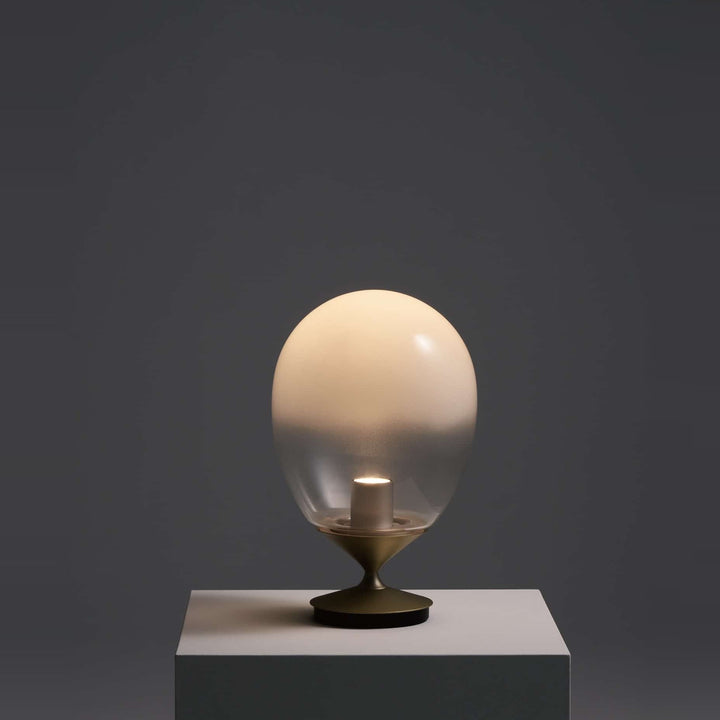 Mist LED Table Lamp by Seed Design, styled in a room setting, view 8