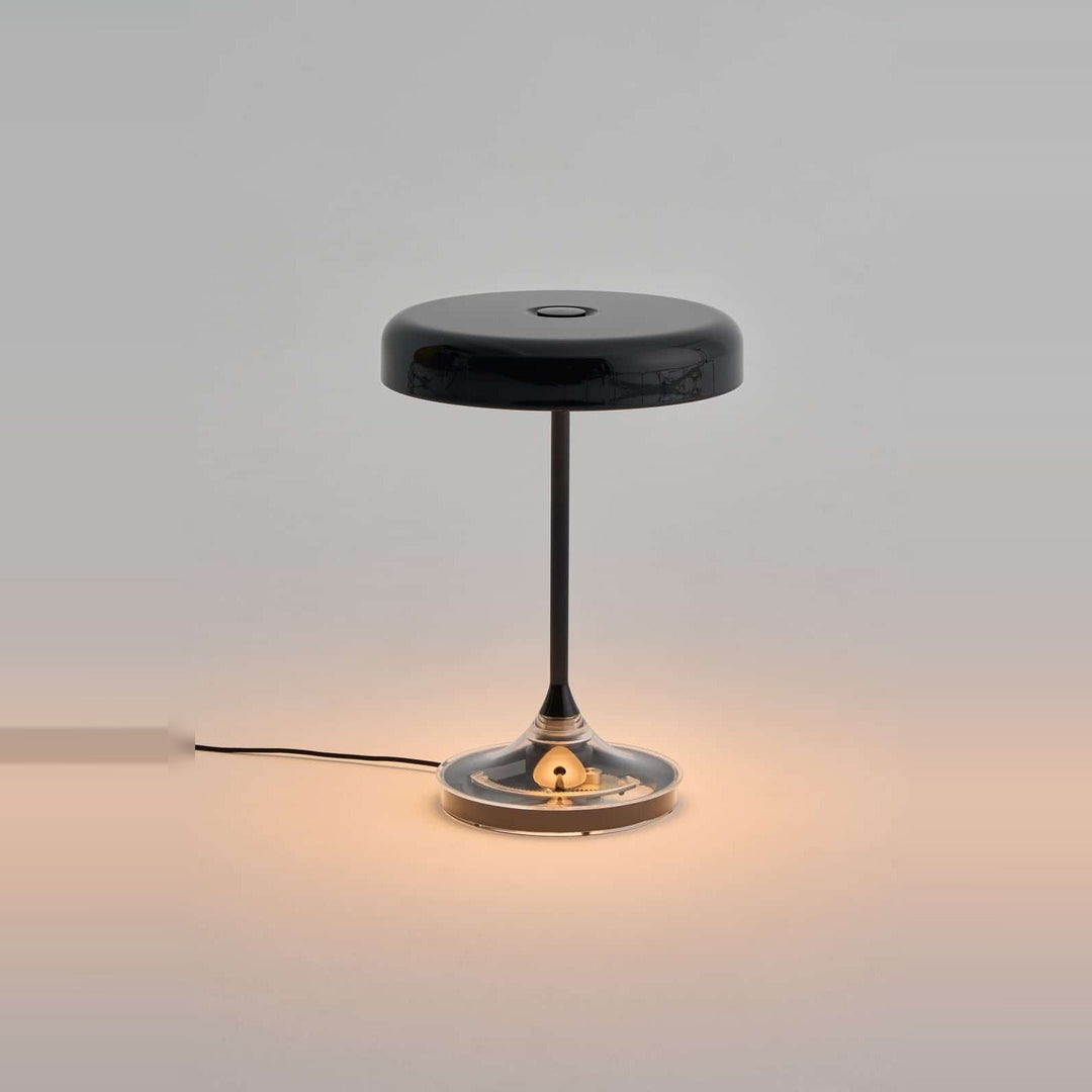 Mr. DJ Table Lamp by Seed Design in Black, styled in a room setting