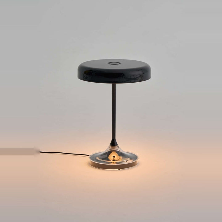 Mr. DJ Table Lamp by Seed Design in Black, styled in a room setting