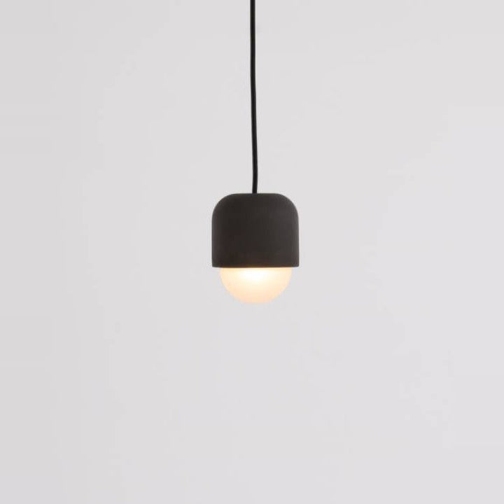 Castle Muse Noir Pendant by Seed Design in Concrete Grey, studio shot