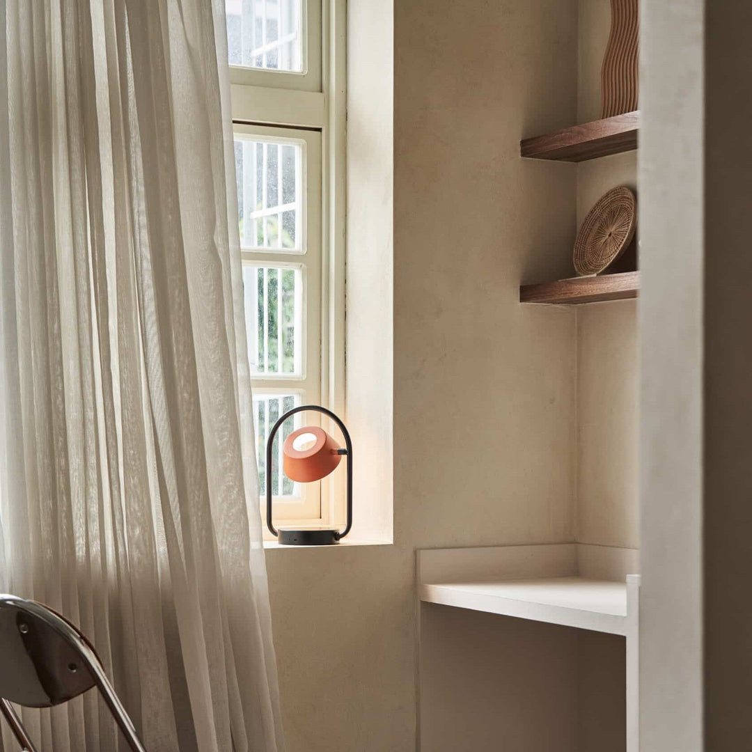 Olo Ring Portable Table Lamp by Seed Design, styled in a room setting, view 3