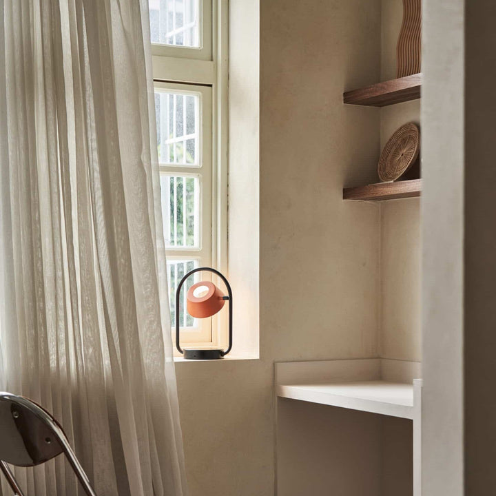 Olo Ring Portable Table Lamp by Seed Design, styled in a room setting, view 3