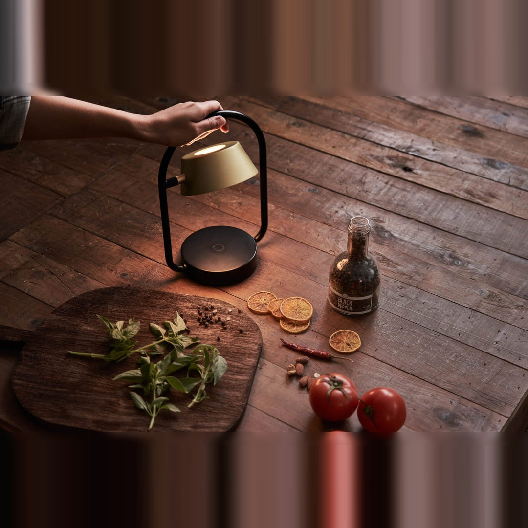 Olo Ring Portable Table Lamp by Seed Design, styled in a room setting, view 2