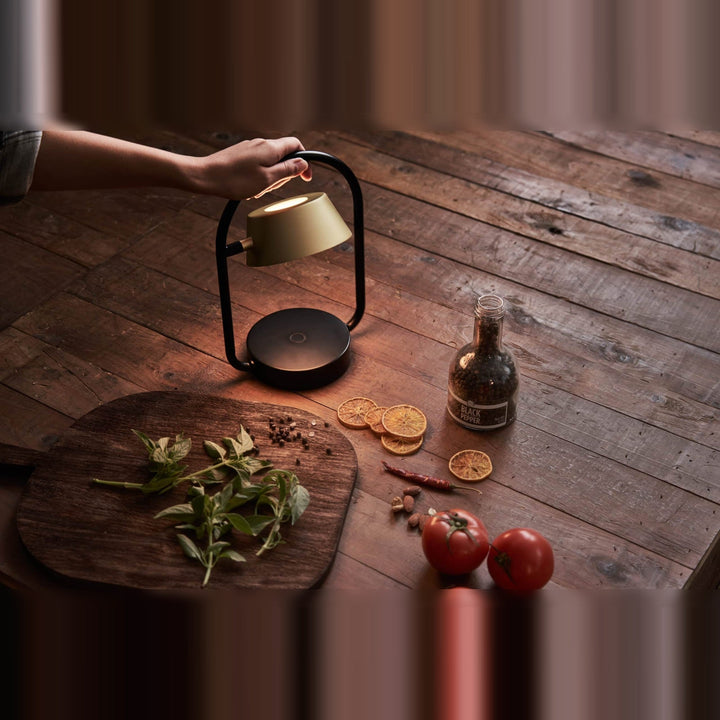 Olo Ring Portable Table Lamp by Seed Design, styled in a room setting, view 2