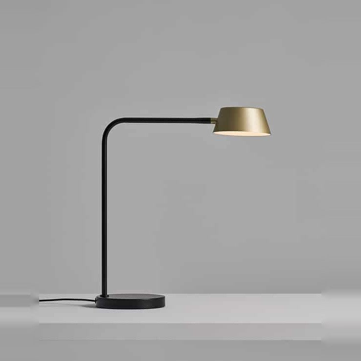Olo Table Lamp by Seed Design in Champagne Gold, studio shot