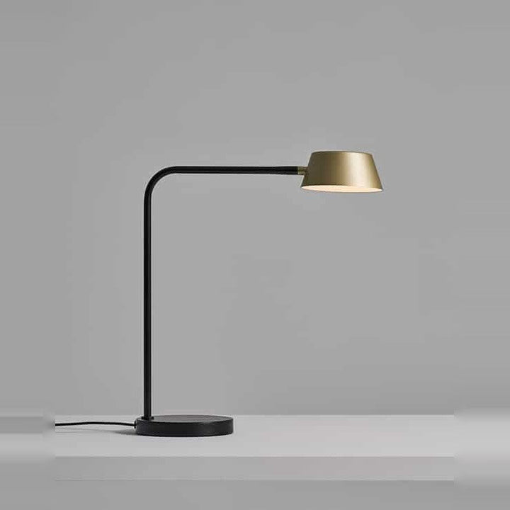 Olo Table Lamp by Seed Design in Champagne Gold, studio shot