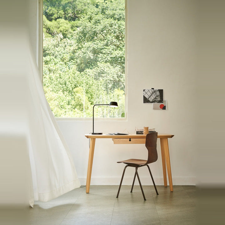 Olo Table Lamp by Seed Design, styled in a room setting