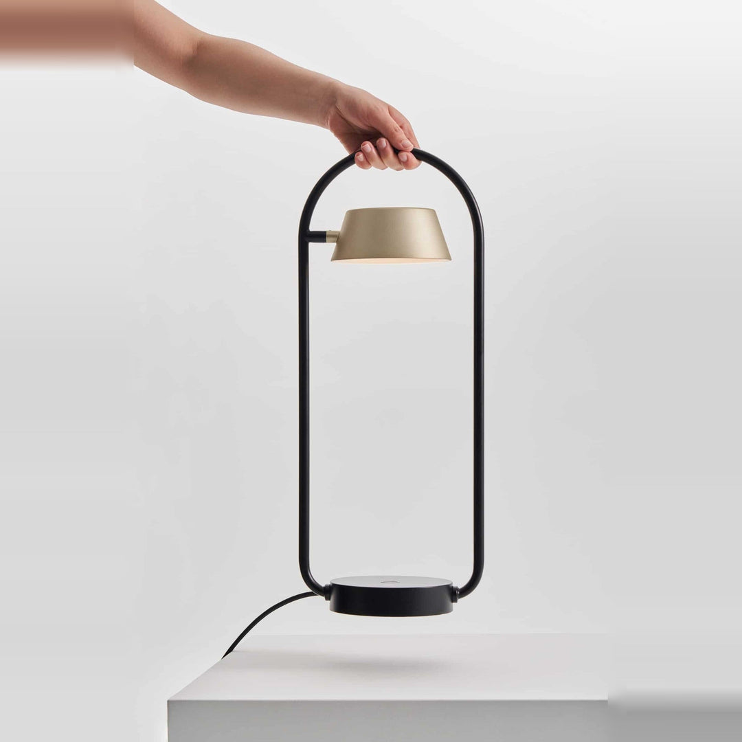 Olo Ring Table Lamp by Seed Design, styled in a room setting, view 2