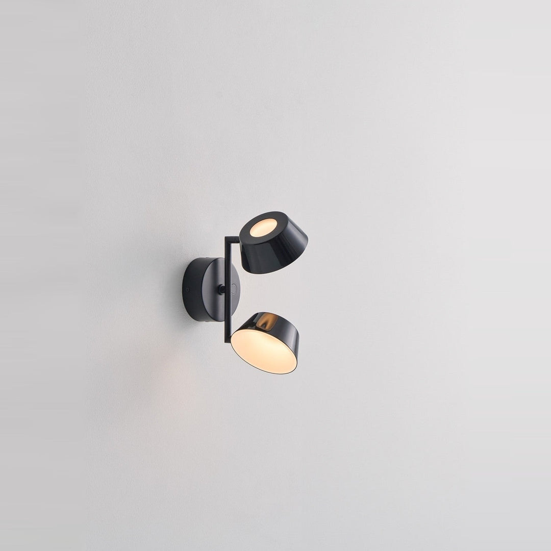 Olo W2 Wall Sconce by Seed Design, styled in a room setting