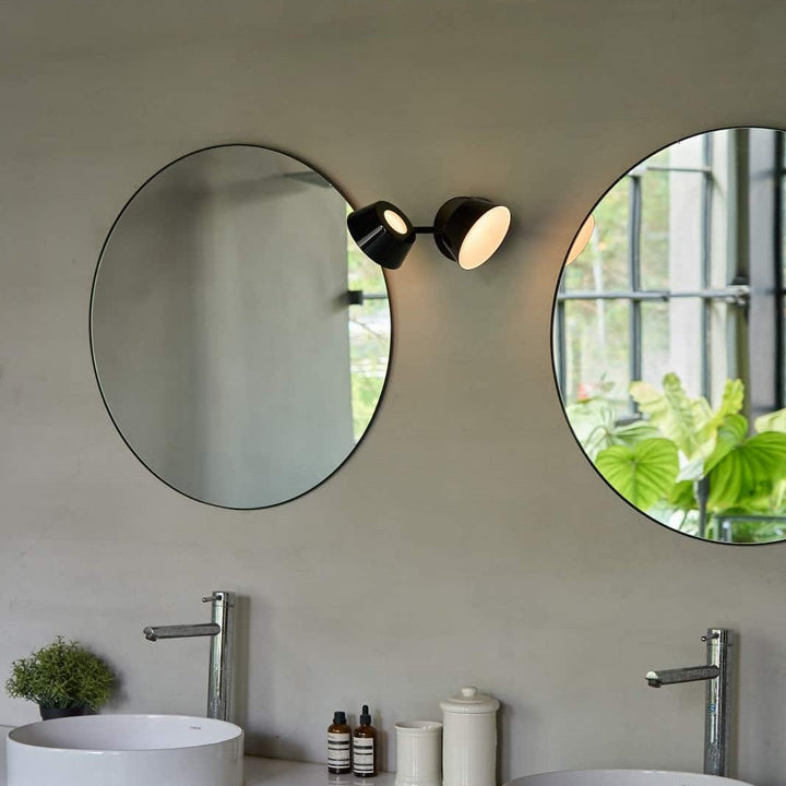 Olo W2 Wall Sconce by Seed Design, styled in a room setting, view 2