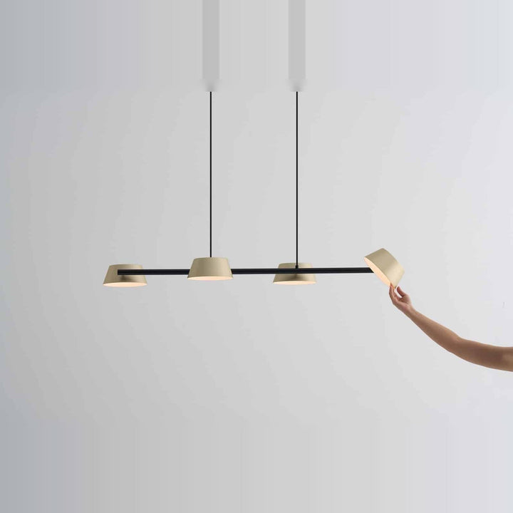 Olo XL Pendant PL4 by Seed Design in Champagne Gold, styled in a room setting