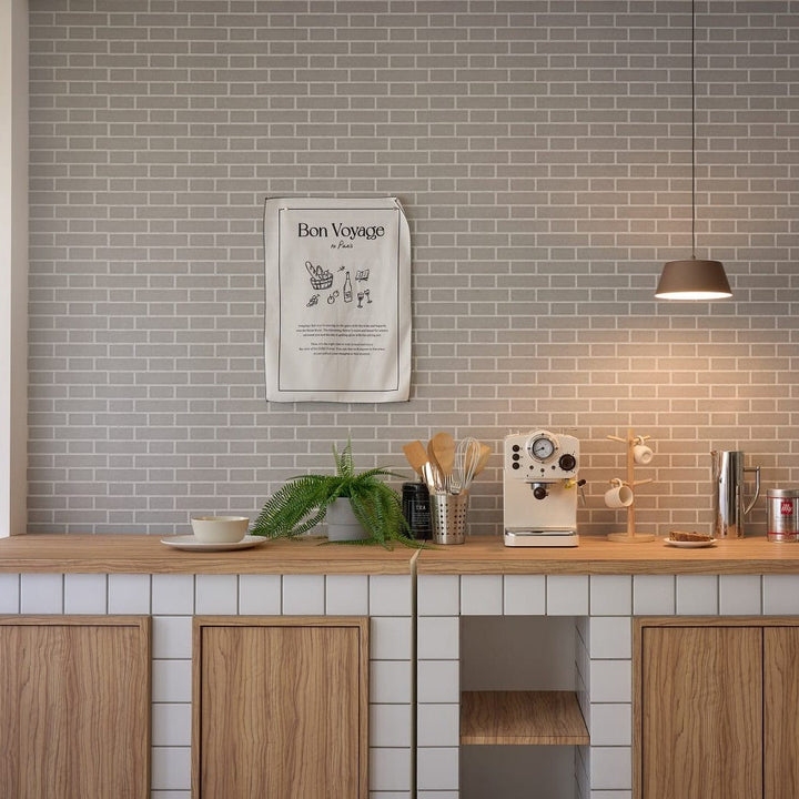 Olo XL Pendant P1 by Seed Design in Cocoa, styled in a room setting