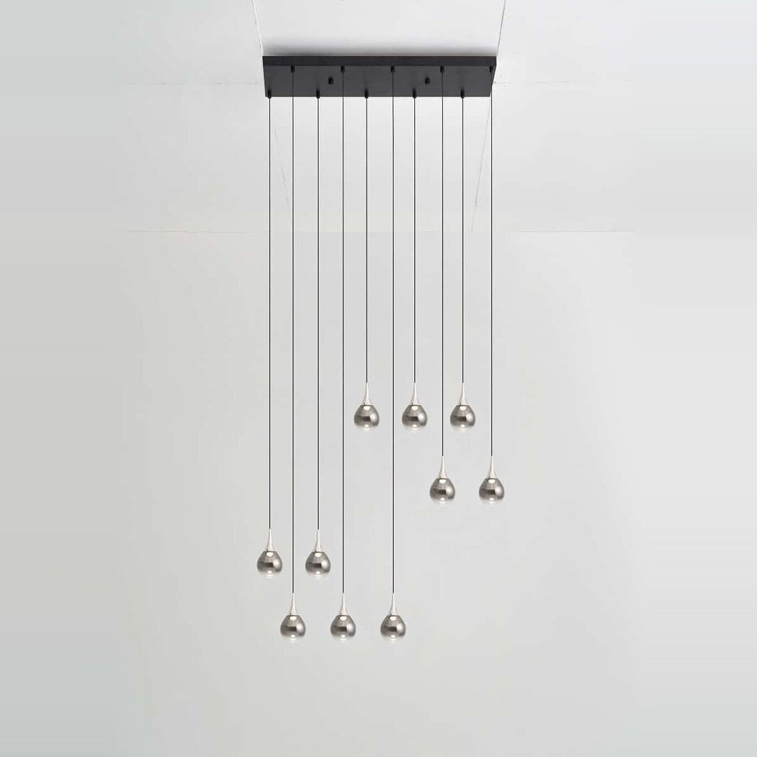 Paopao Pendant PZ10 by Seed Design in Chrome, styled in a room setting