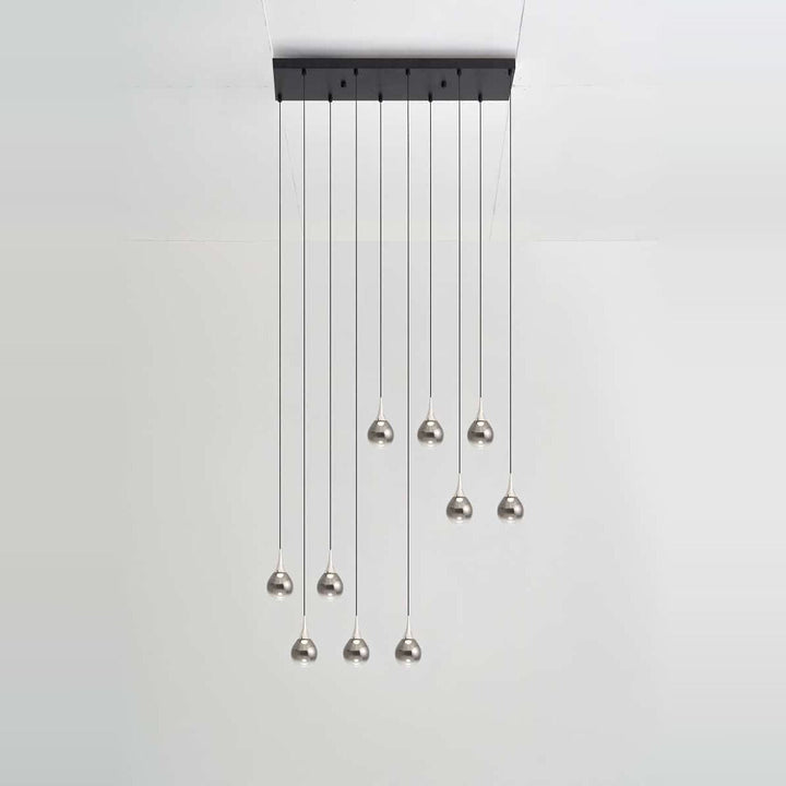 Paopao Pendant PZ10 by Seed Design in Chrome, styled in a room setting
