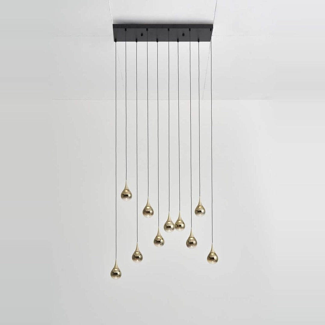 Paopao Pendant PZ10 by Seed Design in Champagne Gold, styled in a room setting