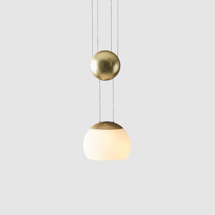 Jojo LED Pendant by Seed Design in Champagne Gold, studio shot