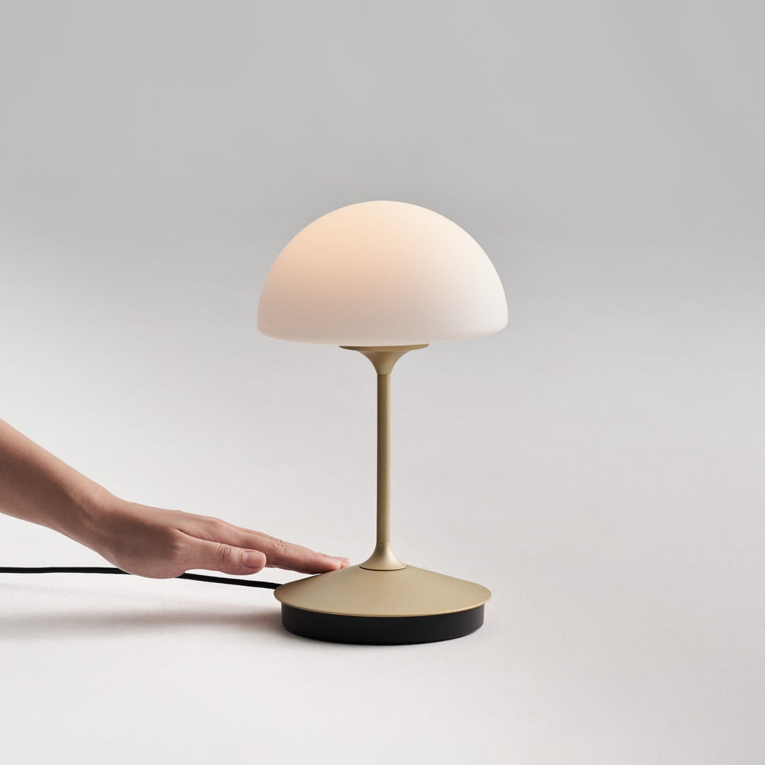 Pensee Table Lamp by Seed Design, styled in a room setting