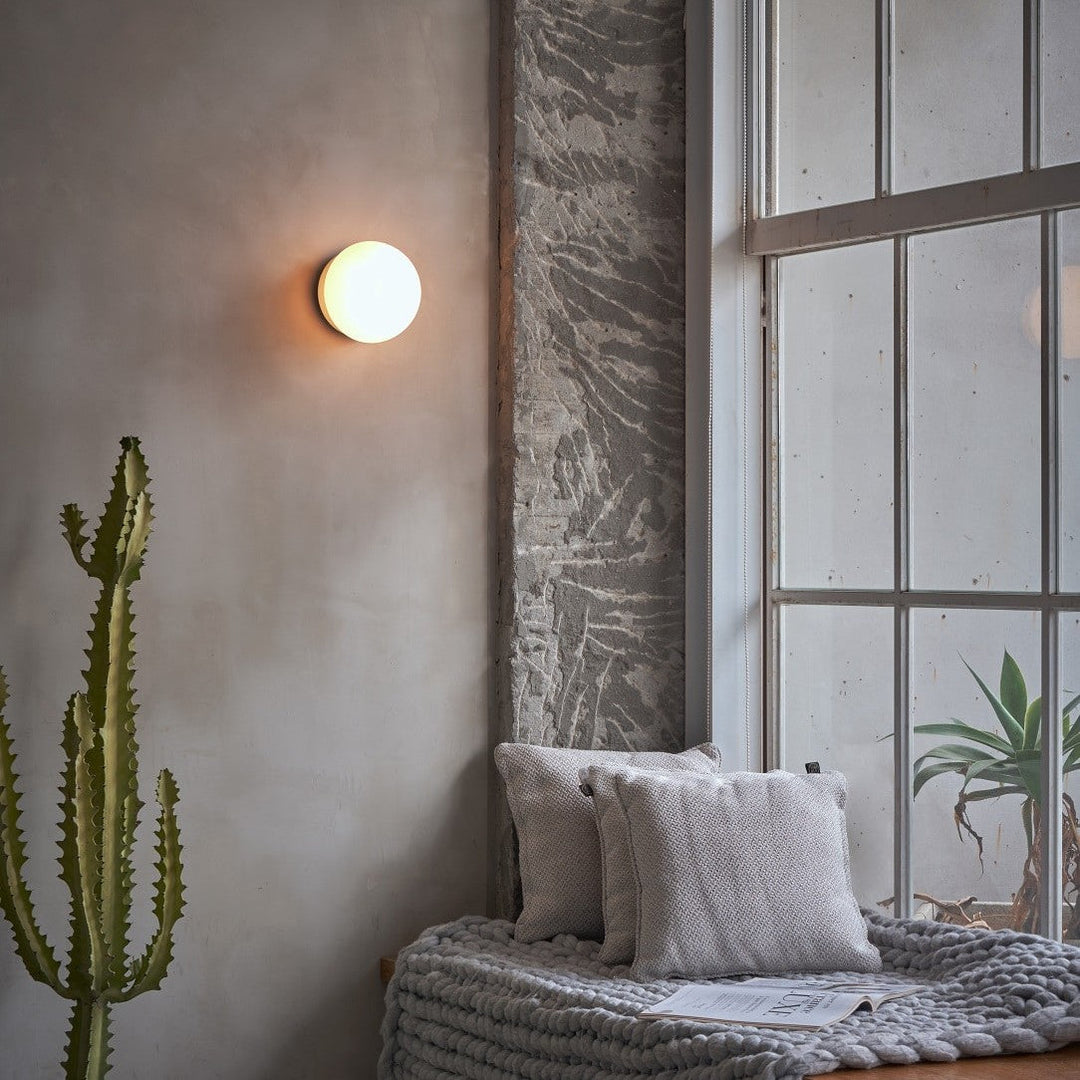 Pensee Wall Sconce by Seed Design, styled in a room setting, view 5