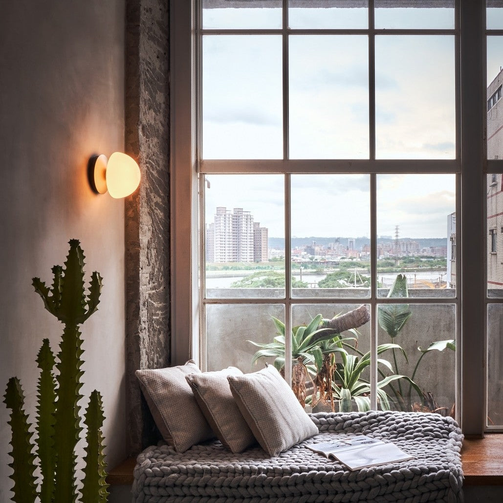 Pensee Wall Sconce by Seed Design, styled in a room setting, view 4