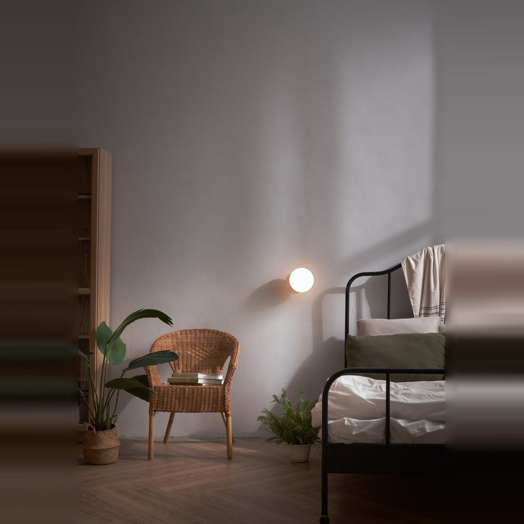 Pensee Wall Sconce by Seed Design, styled in a room setting, view 3