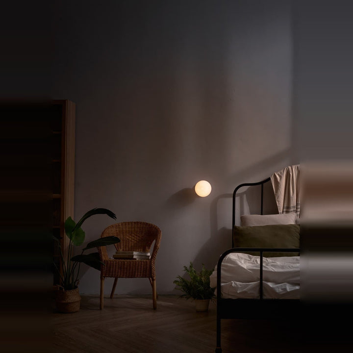 Pensee Wall Sconce by Seed Design, styled in a room setting, view 2