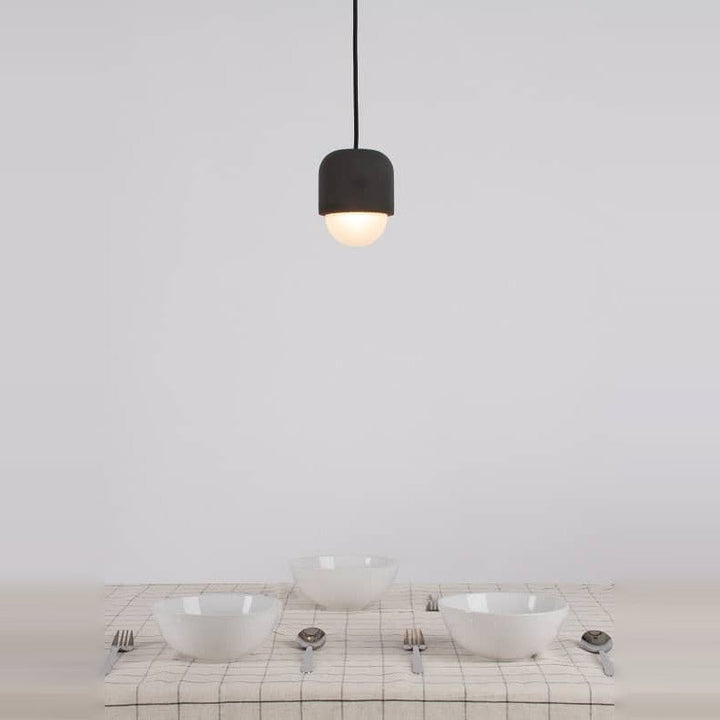 Castle Muse Noir Pendant by Seed Design, styled in a room setting