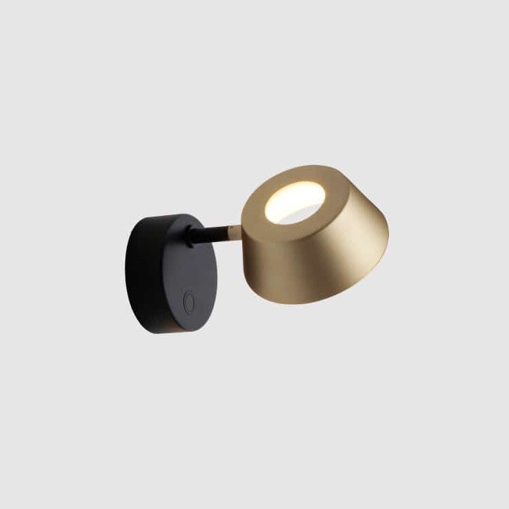 Olo Wall Sconce by Seed Design in Champagne Gold, studio shot