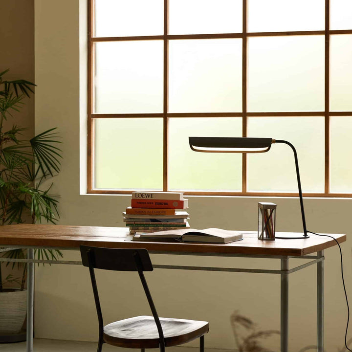 Flo Table Lamp by Seed Design, styled in a room setting