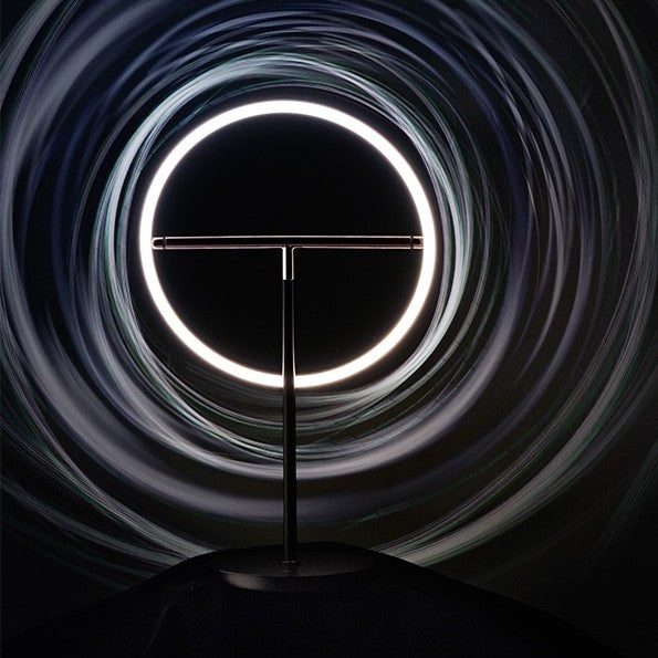 Sol Table Lamp by Seed Design, styled in a room setting