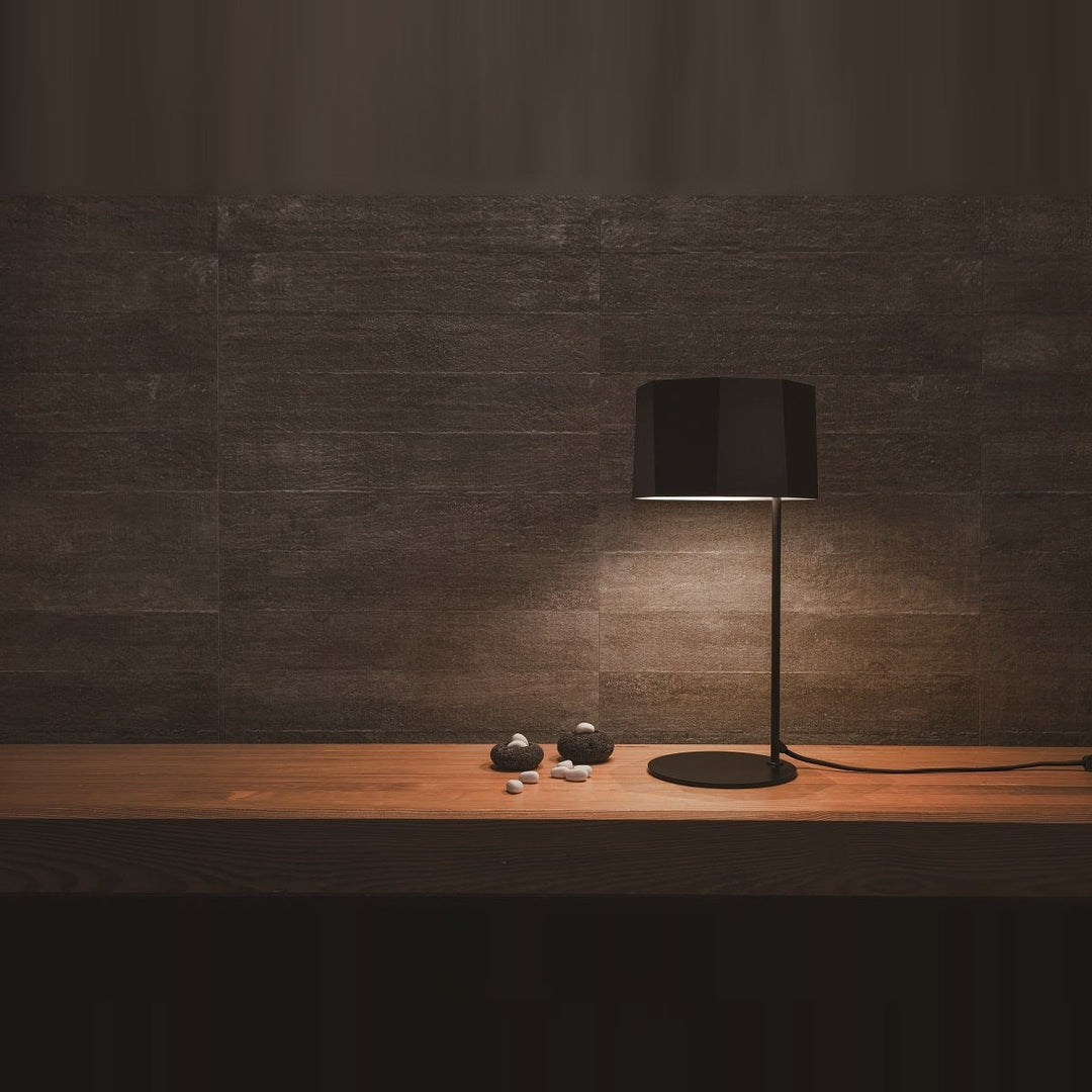 Zhe Table Lamp by Seed Design, styled in a room setting