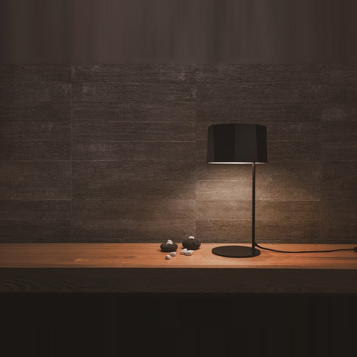 Zhe Table Lamp by Seed Design, styled in a room setting