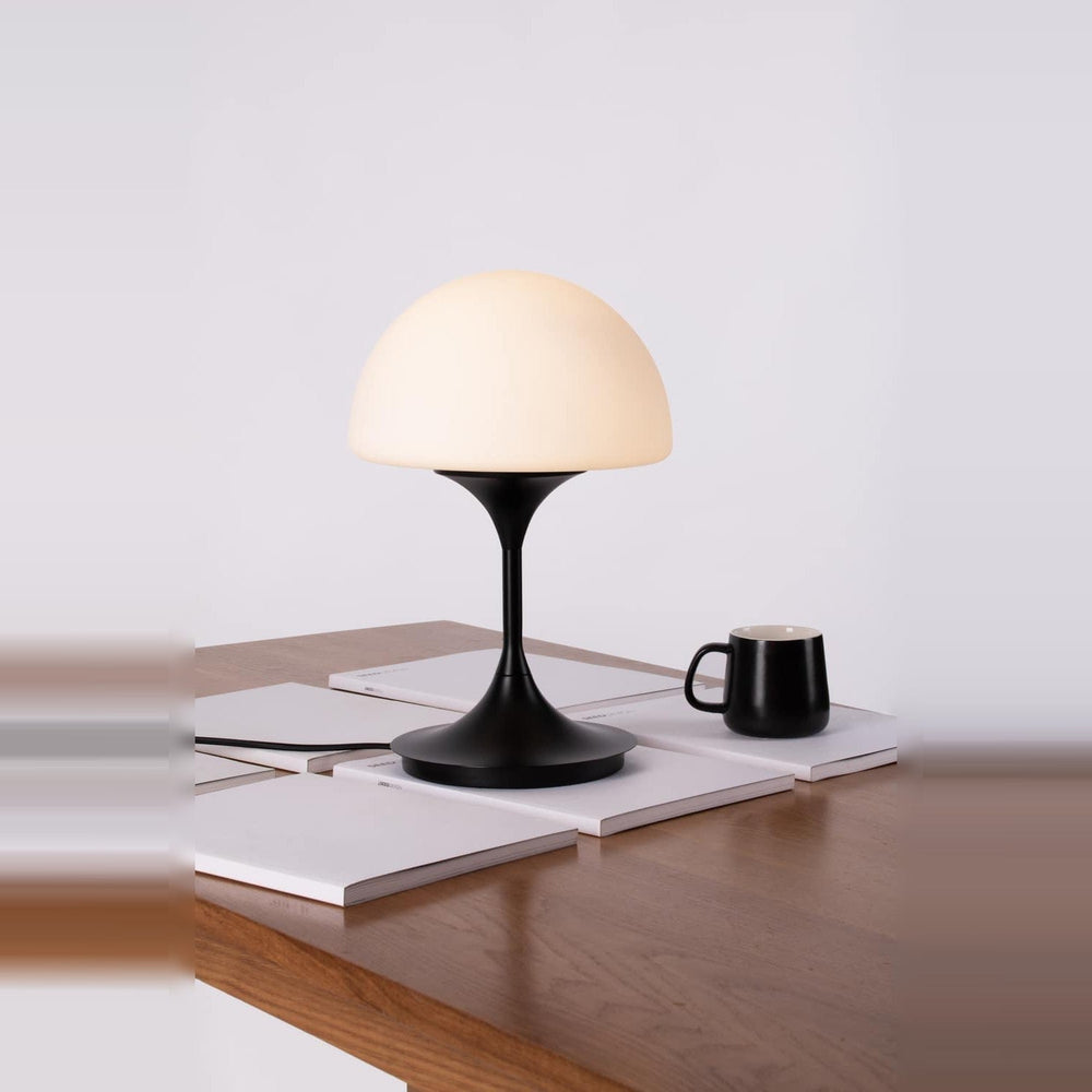 Pensee L Table Lamp by Seed Design in Black, styled in a room setting