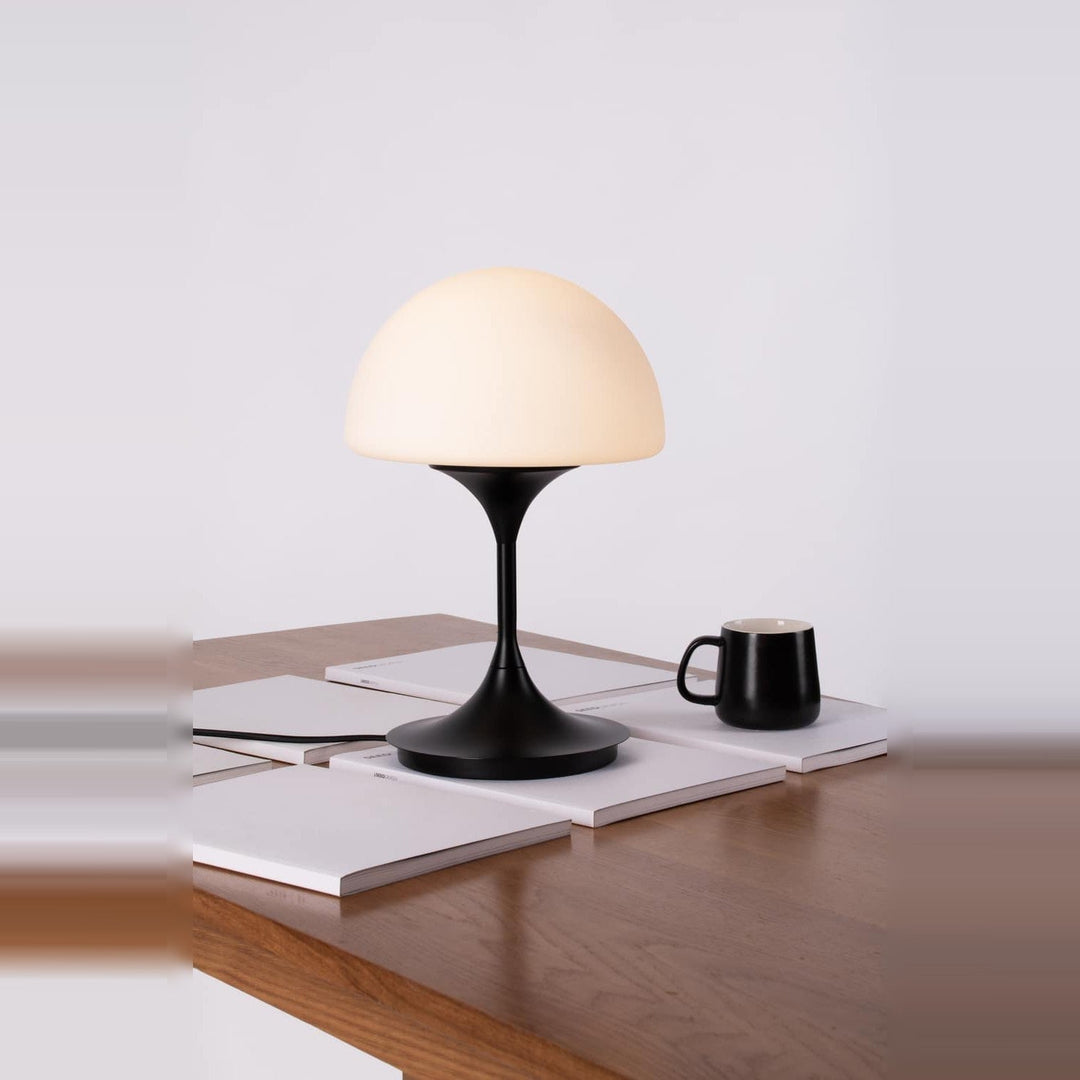 Pensee L Table Lamp by Seed Design in Black, styled in a room setting