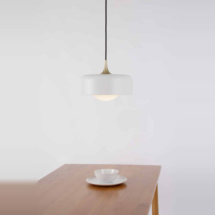 Pensee L Pendant by Seed Design in White, styled in a room setting