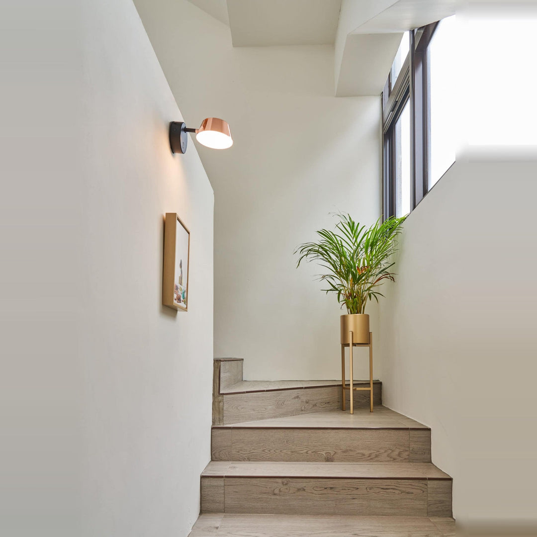 Olo Wall Sconce by Seed Design, styled in a room setting, view 2