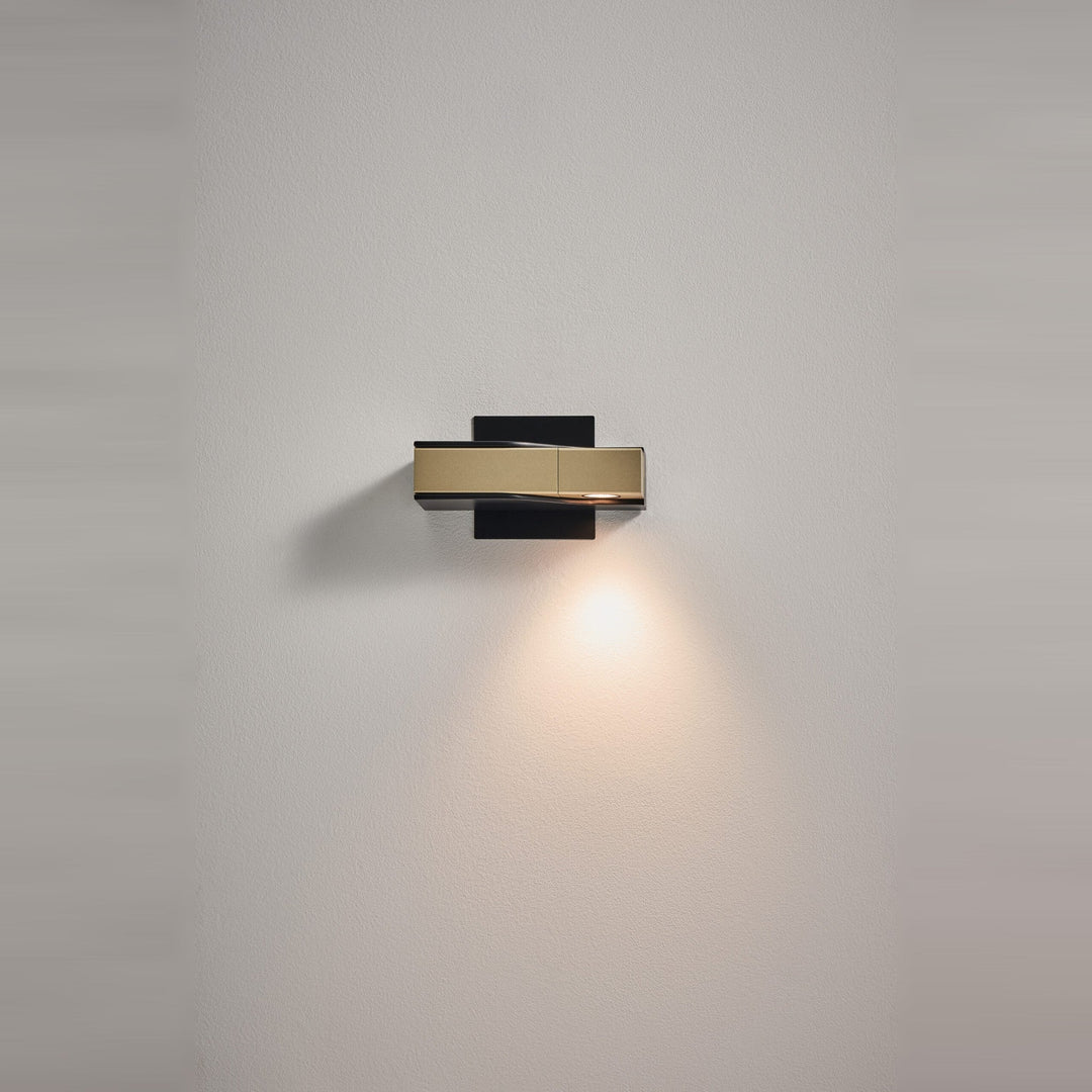 Wu Wall Sconce by Seed Design in Champagne Gold, studio shot