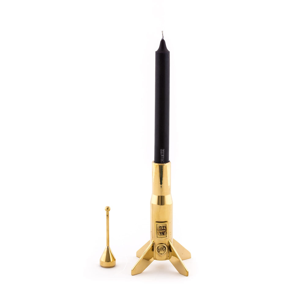 Seletti Cosmic Diner Lunar Hard Rocket Small, rocket holder with a tall black taper beside its brass snuffer