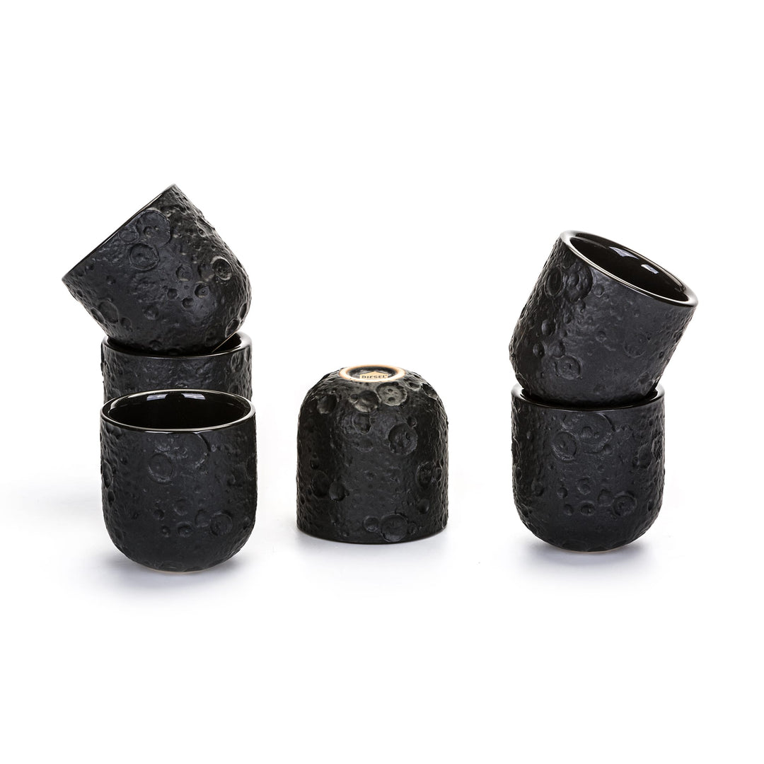 Seletti Cosmic Diner Lunar Coffee Cups (Set of 6), six black cratered stoneware espresso cups, some stacked