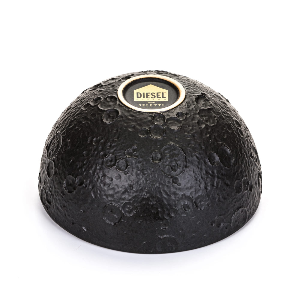 Seletti Cosmic Diner Lunar Bowl Small, small bowl turned over to show the crater relief and Diesel base label