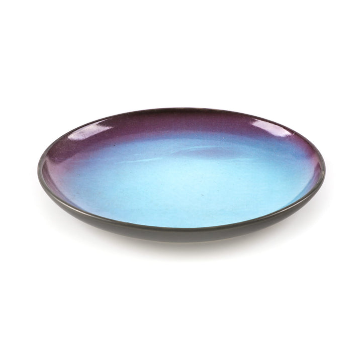 Seletti Cosmic Diner Neptune Fruit/Dessert Plate, angled view of the blue and violet print