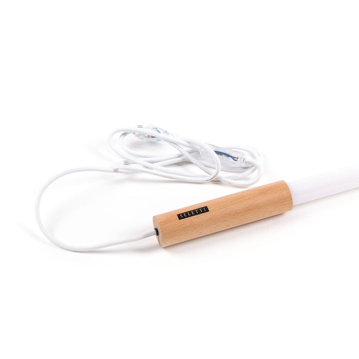 Seletti Linea LED White, close-up of the wooden end cap and white cord with inline switch