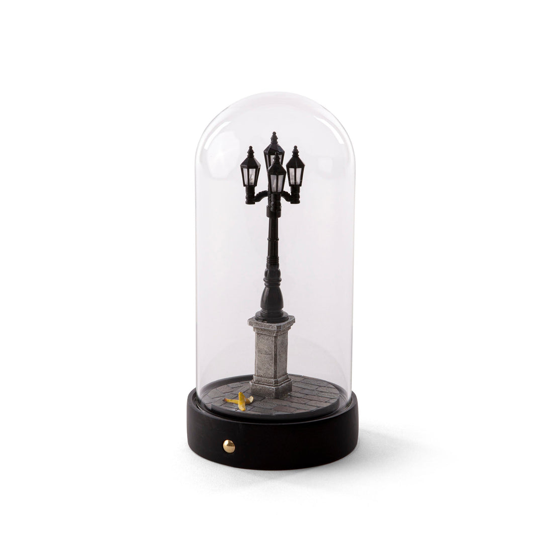 Seletti My Little Corner, triple-lantern street lamp on a stone plinth under a glass dome, black base