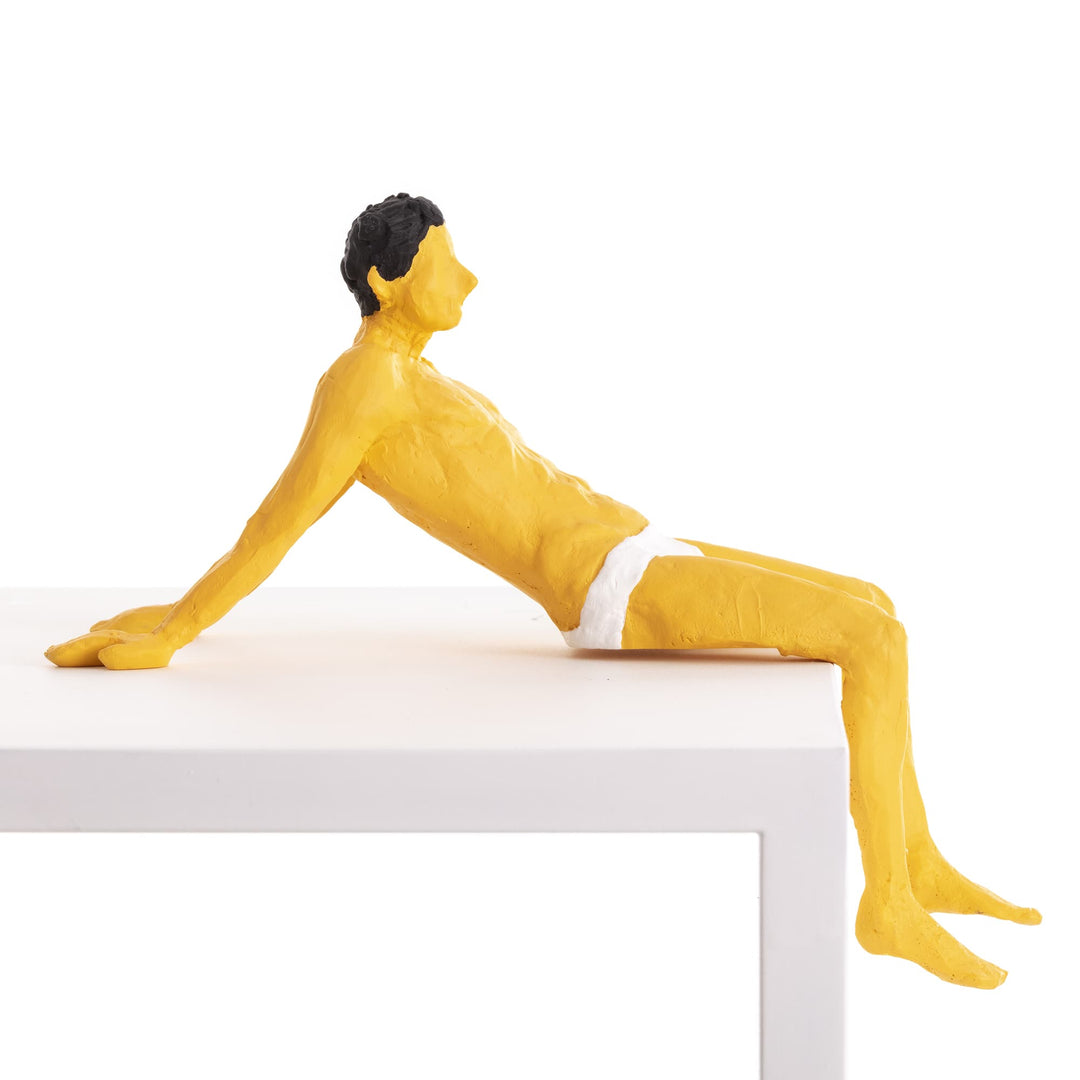 Seletti Love Is a Verb Pierrot Figurine, Pierrot from the other side, legs dangling over the edge