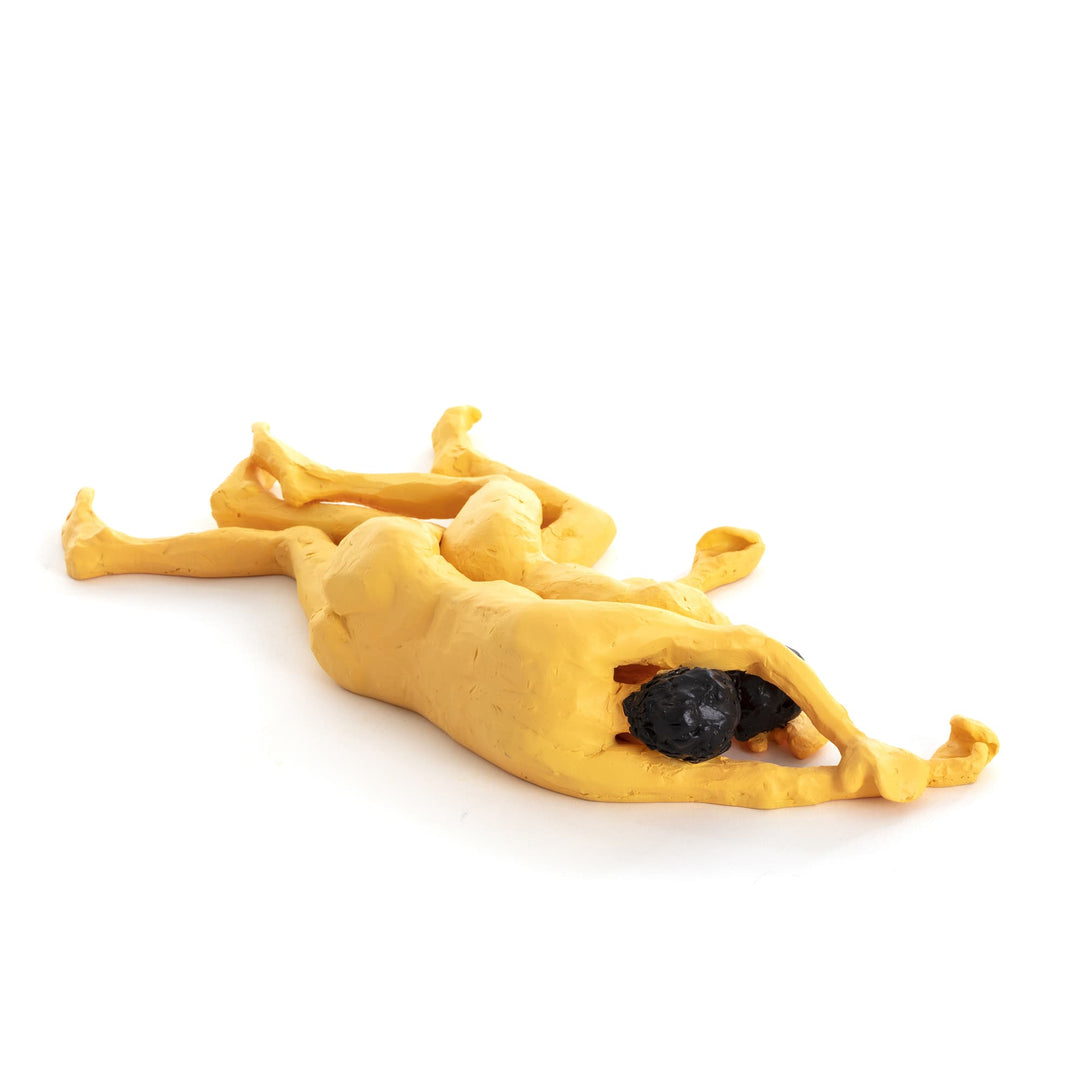 Seletti Love Is a Verb Spoons Figurine, the spooning pair from a low side angle