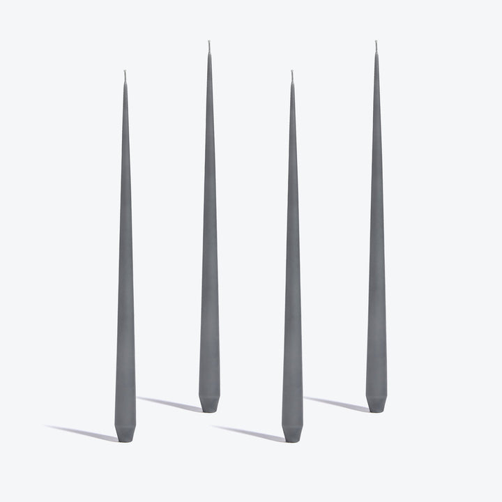 Tapered Candle, Set of 4 — four tall Light Grey candles standing upright on a white background