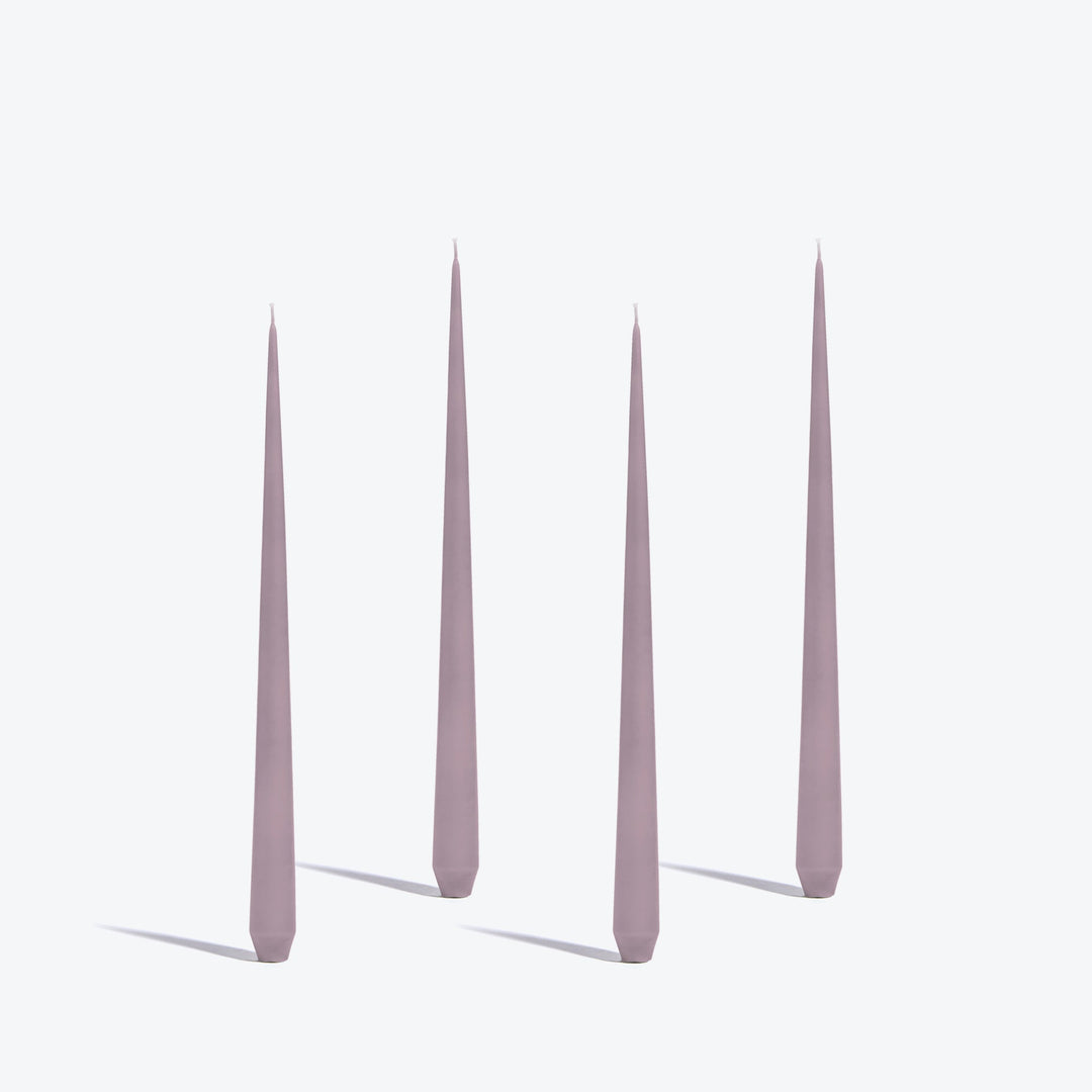 Tapered Candle, Set of 4 — four medium Mauve candles standing upright on a white background
