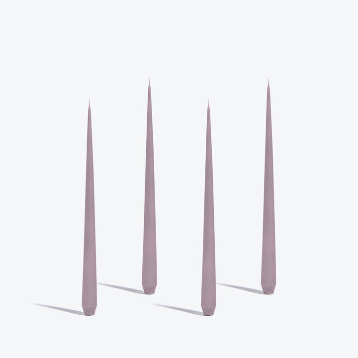 Tapered Candle, Set of 4 — four medium Mauve candles standing upright on a white background
