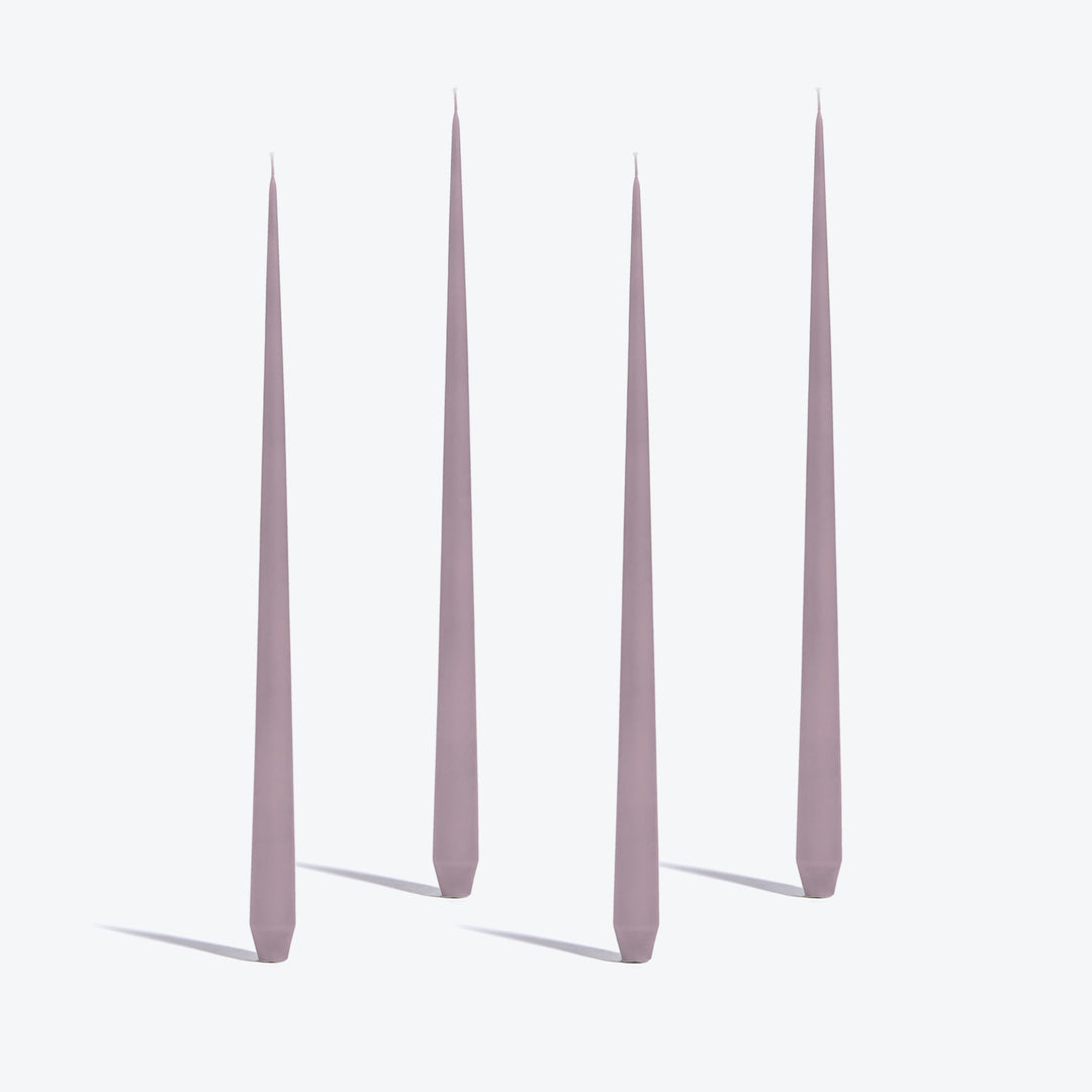Tapered Candle, Set of 4 — four tall Mauve candles standing upright on a white background