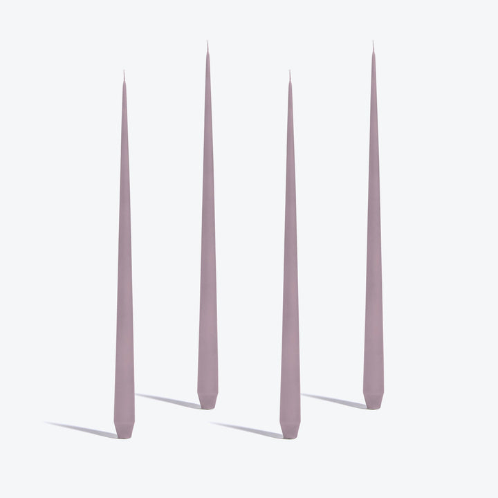 Tapered Candle, Set of 4 — four tall Mauve candles standing upright on a white background