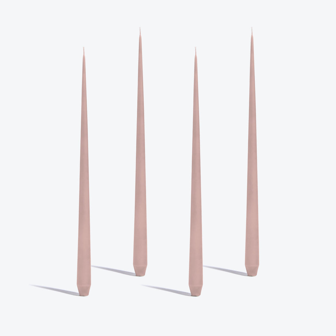 Tapered Candle, Set of 4 — four tall Rose candles standing upright on a white background